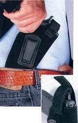 Concealed handgun in waistband holster