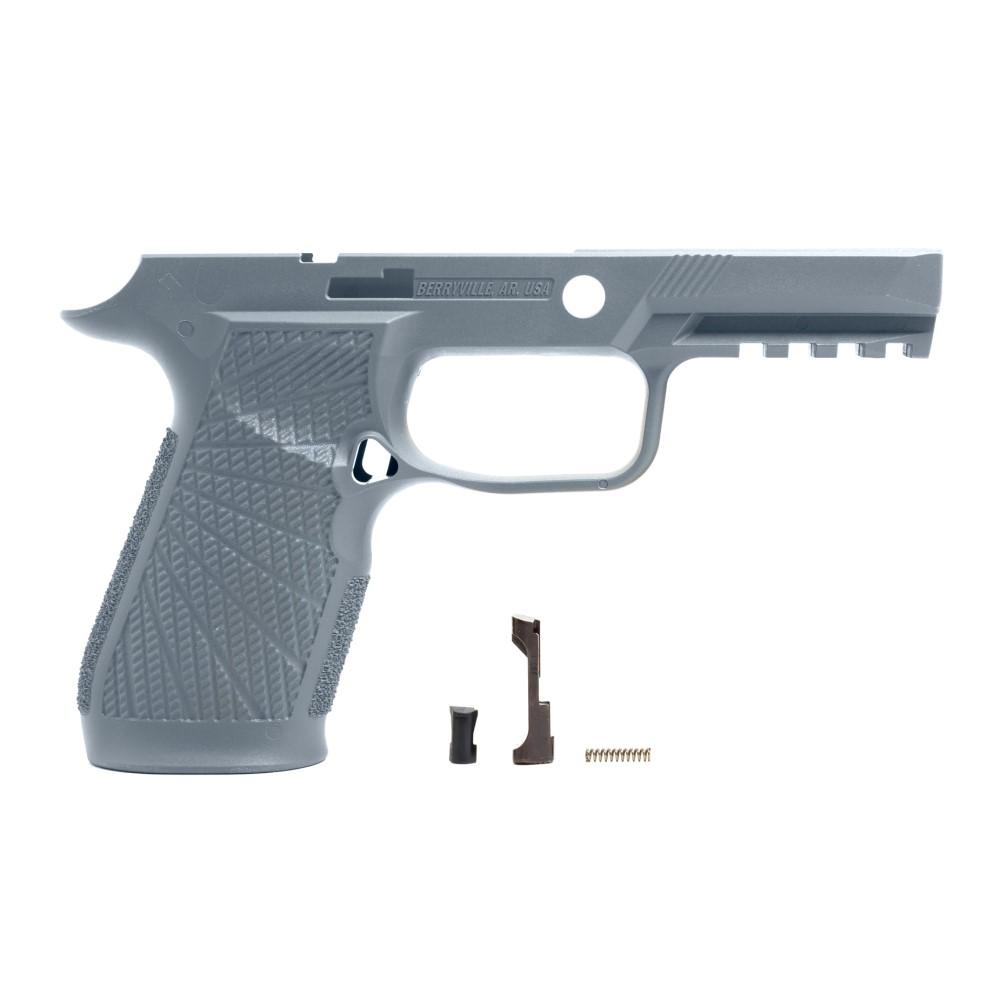 Gray handgun frame with small internal parts