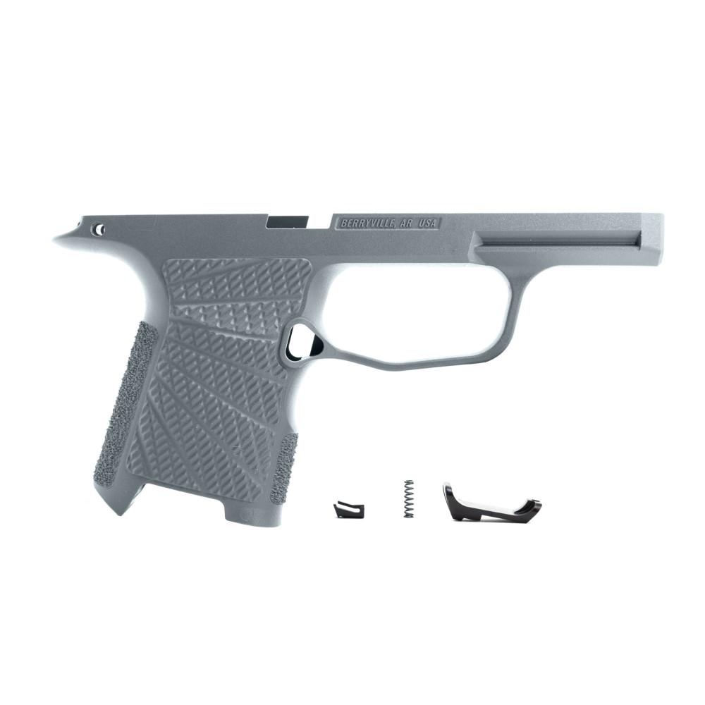 Gray handgun frame with small internal parts