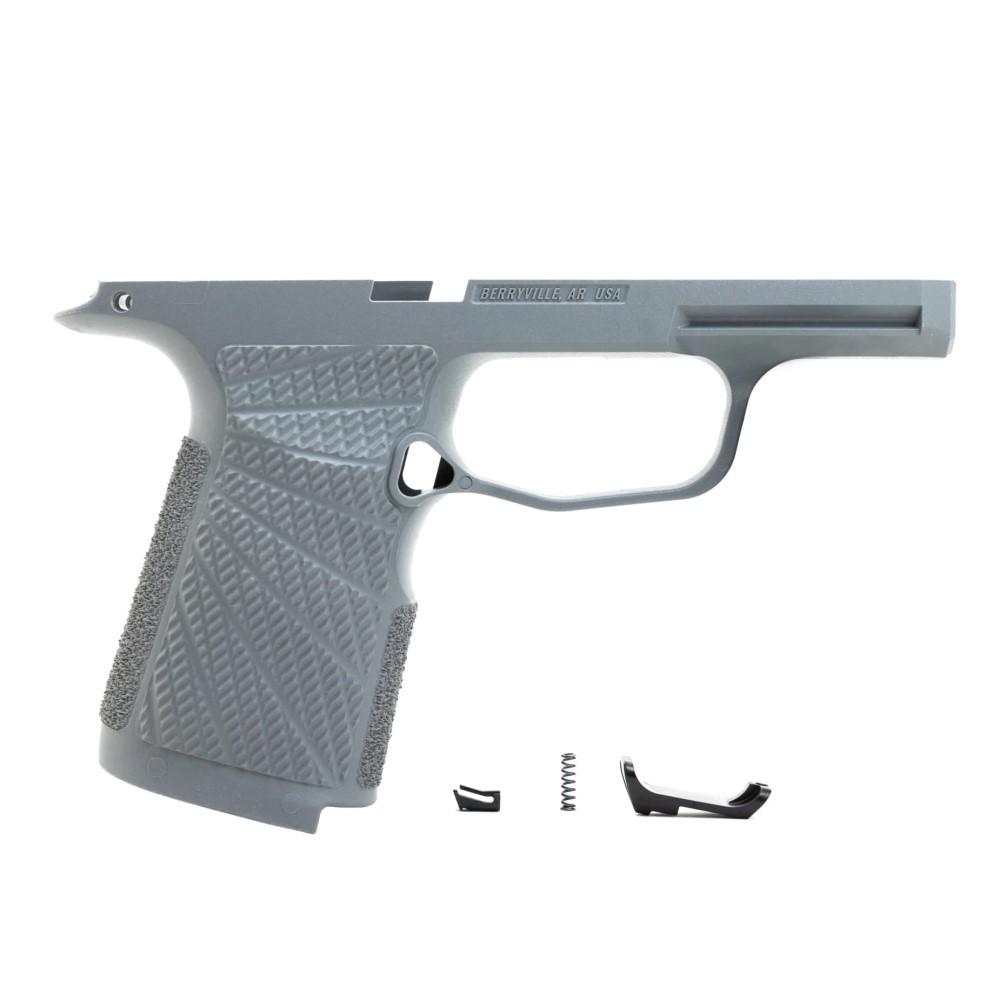 Gray handgun frame with grip and small parts