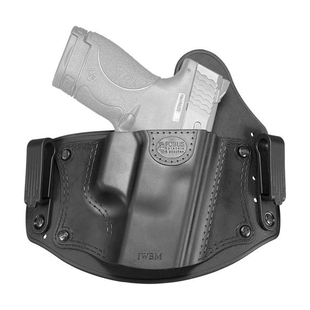 Handgun in black belt holster