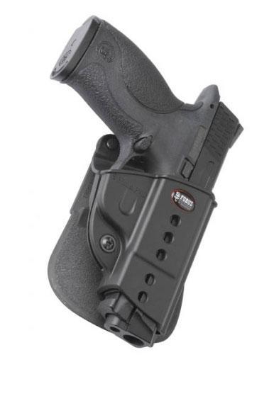 Handgun secured in black concealed carry holster