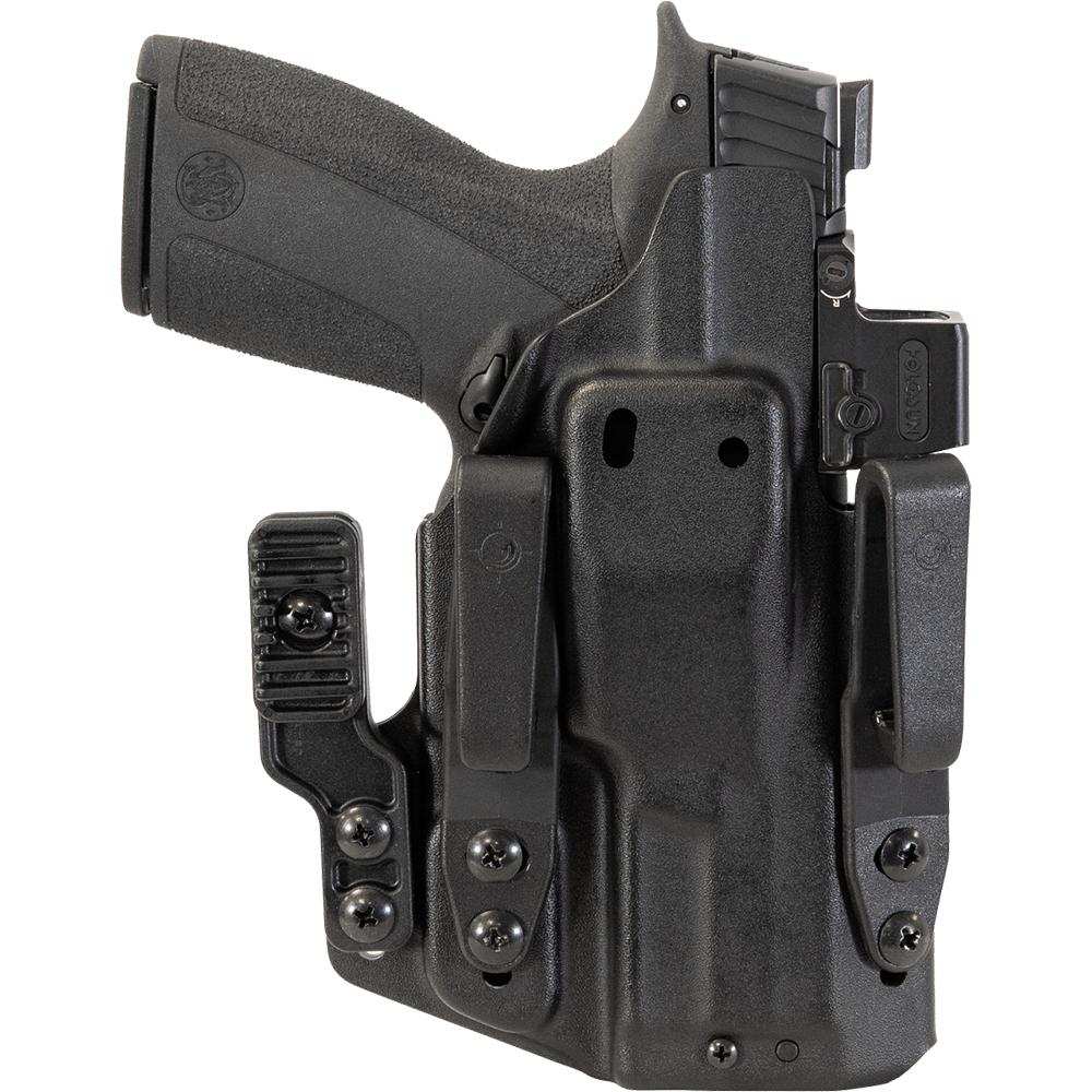 Black handgun in molded concealed carry holster