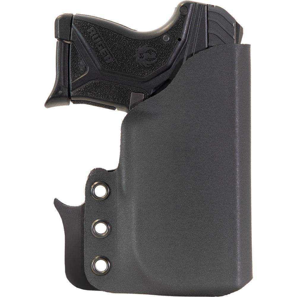 Compact handgun in black holster