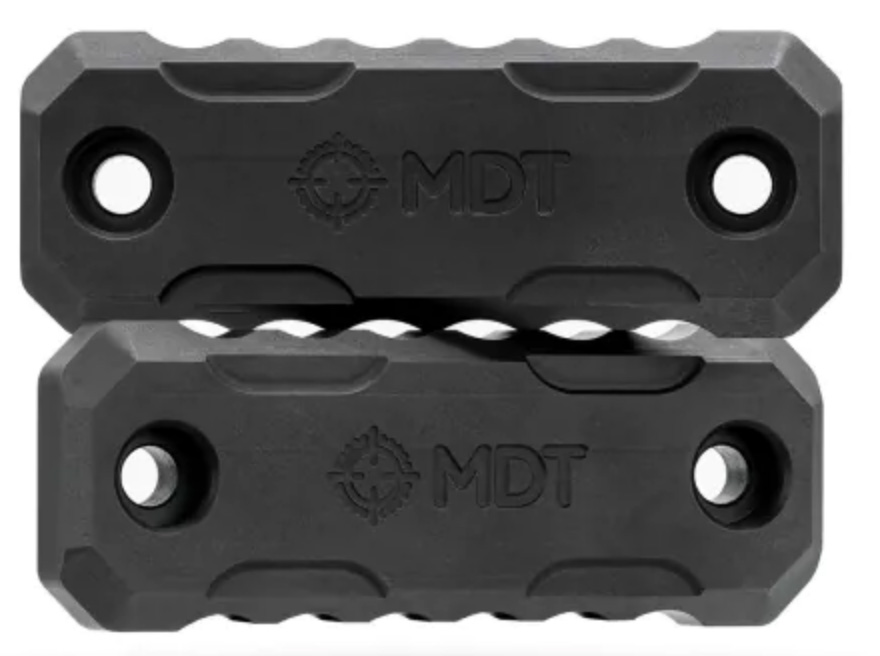 Two black MDT metal mounting rail pieces
