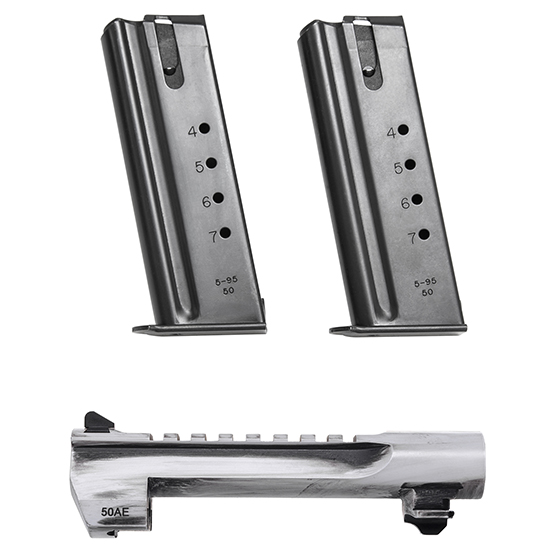 Two handgun magazines and pistol slide
