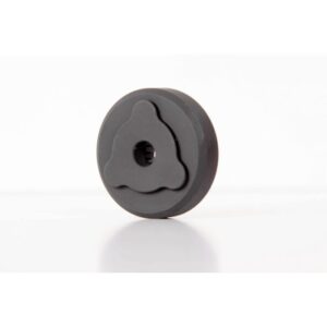 Black circular knob with three-lobed center design