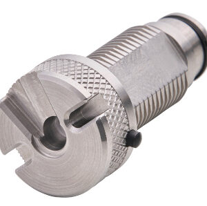 Machined metal cylindrical component with grooves and slots