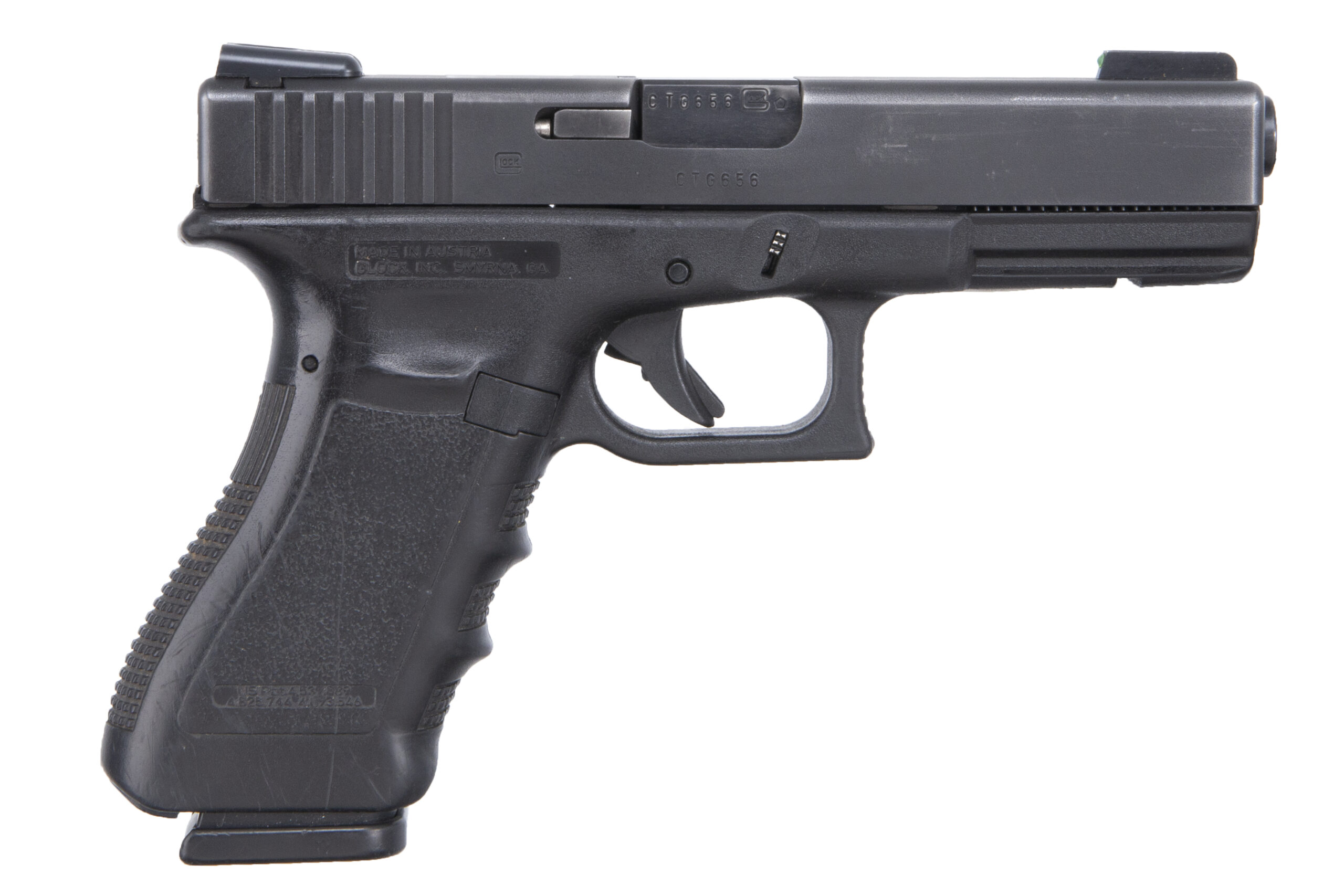 Black semi-automatic handgun on white background