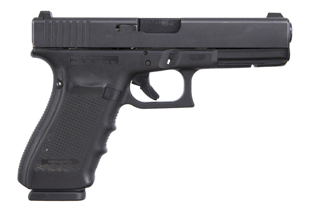 Black semi-automatic handgun on white background