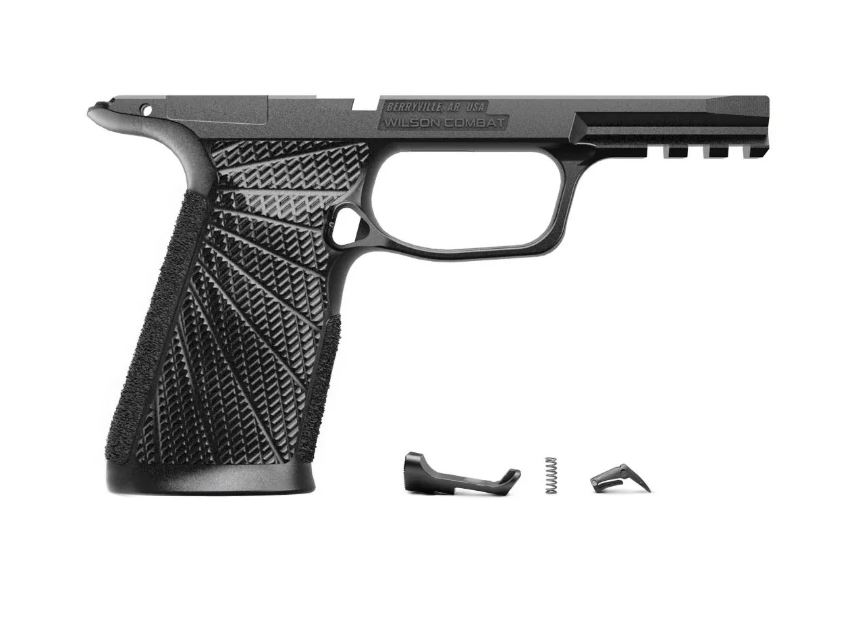 Black handgun frame with grip and components