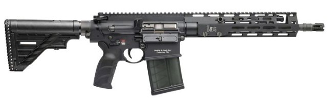 Black modern semi-automatic rifle with extended magazine