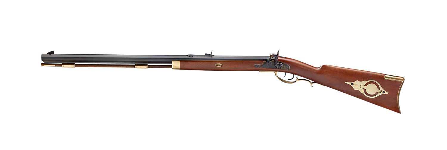 Antique flintlock muzzleloader rifle with wooden stock