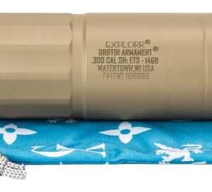 Tan rifle suppressor with mounting adapter and pouch