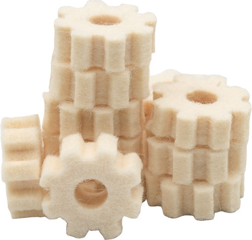 Stacked gear-shaped white sugar cubes