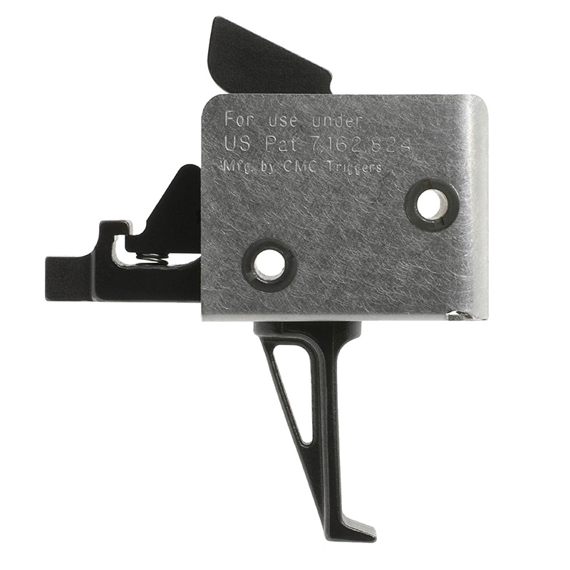 Metal firearm trigger assembly on white background