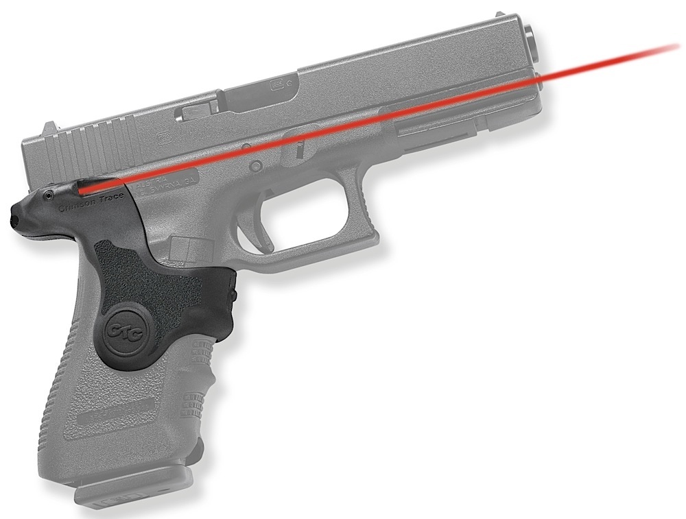 Handgun with red laser sight attached