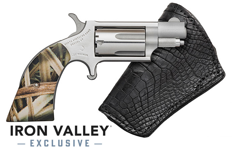 Revolver with camouflage grip and black holster