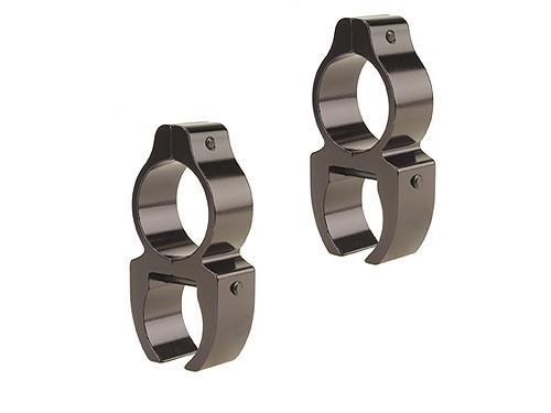 Two metallic scope mounting rings on white background