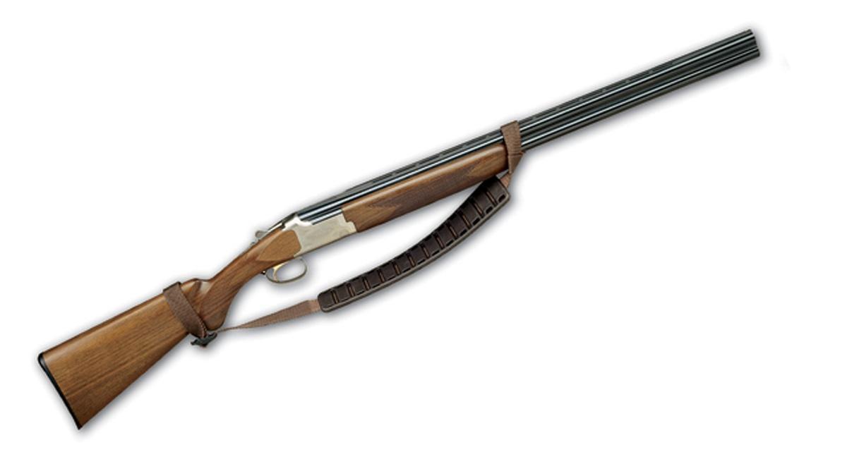 Double-barrel shotgun with wooden stock and sling
