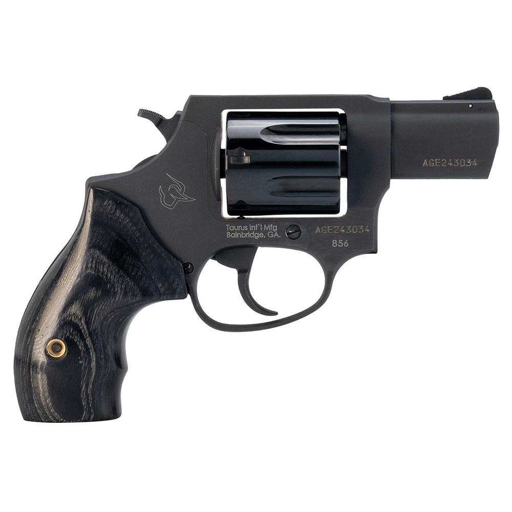 Black revolver handgun with wooden grip