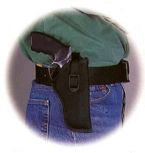 Handgun in black holster on belt