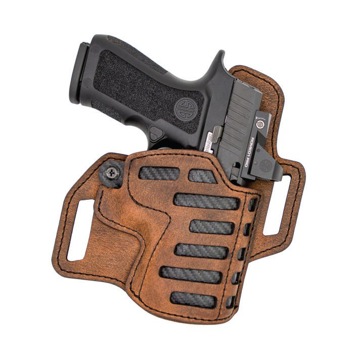 Handgun in brown leather holster