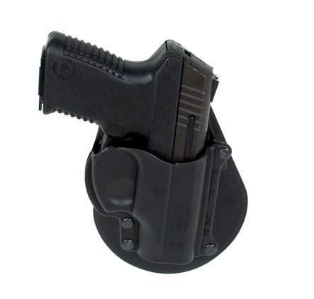 Black handgun in a molded belt holster