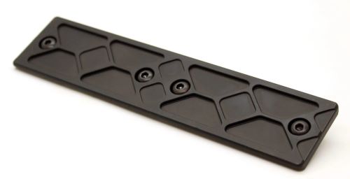 Black metal mounting rail with geometric cutouts