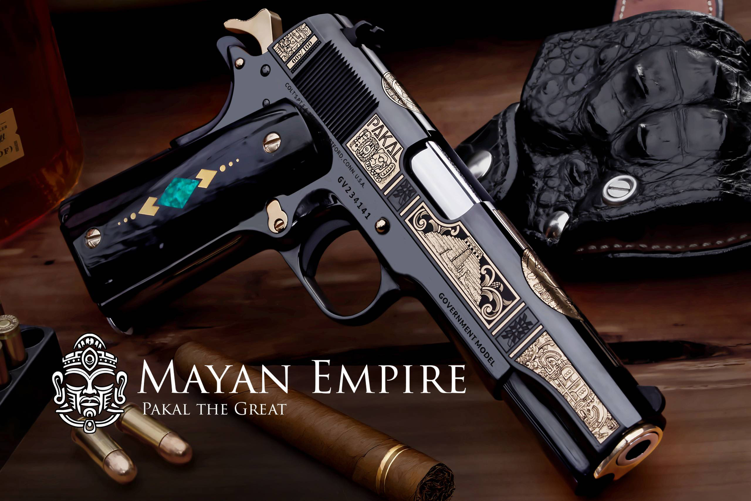 Engraved Mayan-themed 1911 pistol on wooden table