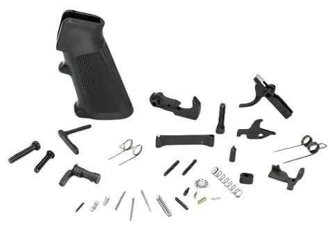 Disassembled handgun parts arranged on white background