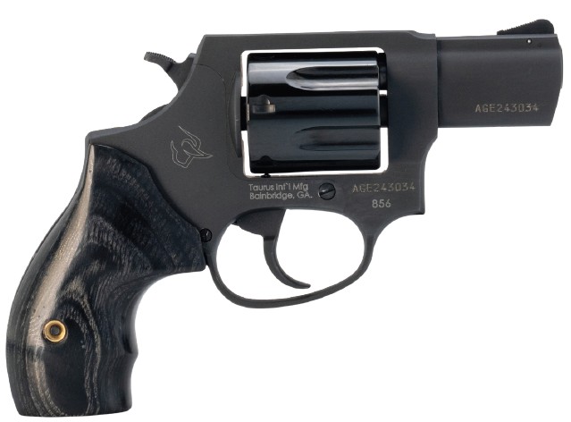 Black revolver handgun on white background