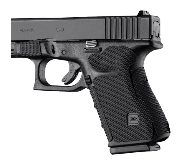 Black semi-automatic handgun on white background