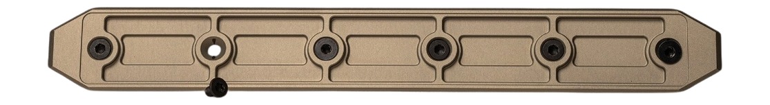 Tan metal mounting rail with screw holes