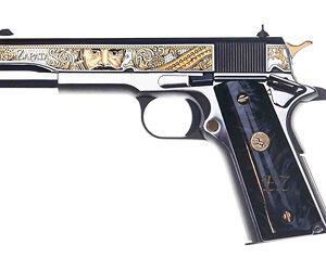 Ornate engraved semi-automatic pistol on white background