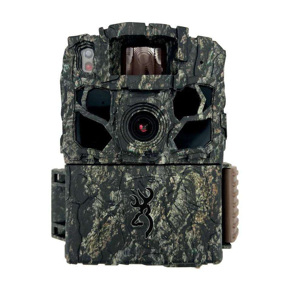 Camouflage trail camera with lens and sensors
