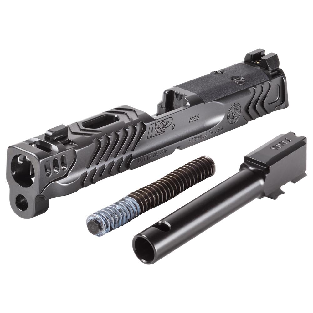 Handgun slide and barrel components on white background