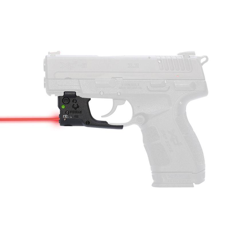 Handgun with mounted red laser sight attachment