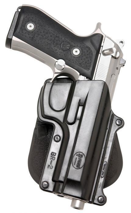 Handgun in black holster on white background