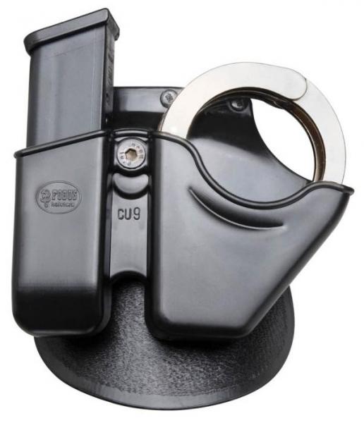 Black metal holster device on round base