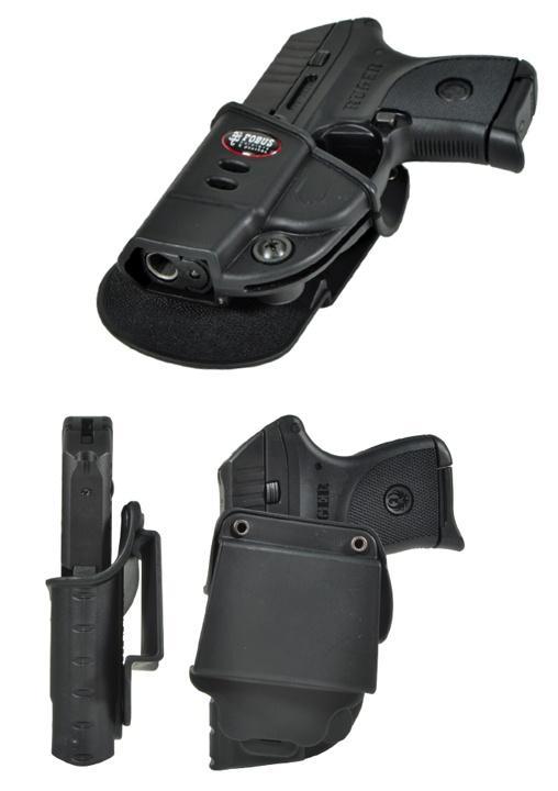 Handgun in black holster with magazine pouch