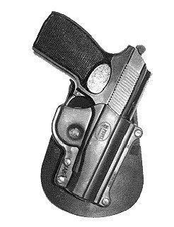 Handgun in black holster on white background