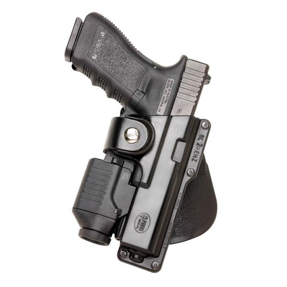 Handgun in black holster with mounted light