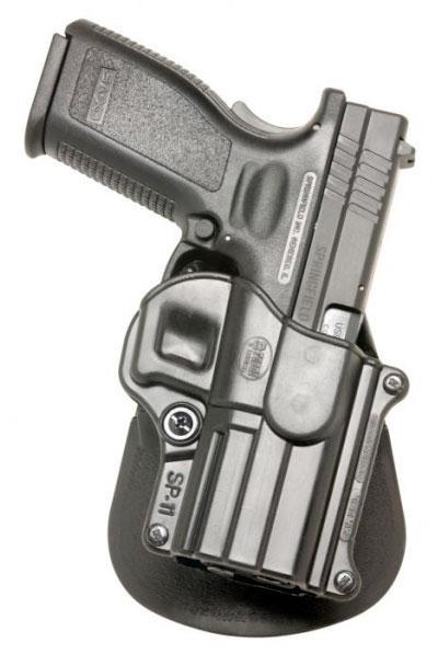 Black semi-automatic pistol in holster on white background