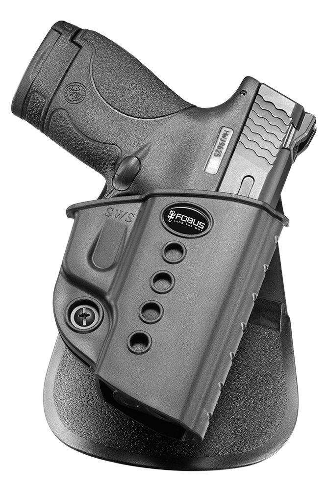 Compact handgun in black polymer holster