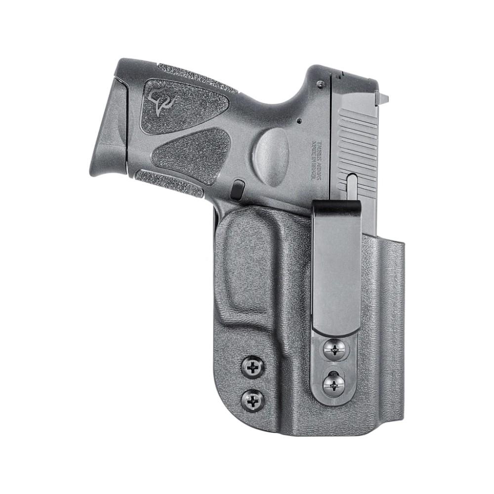 Handgun in black holster with belt clip
