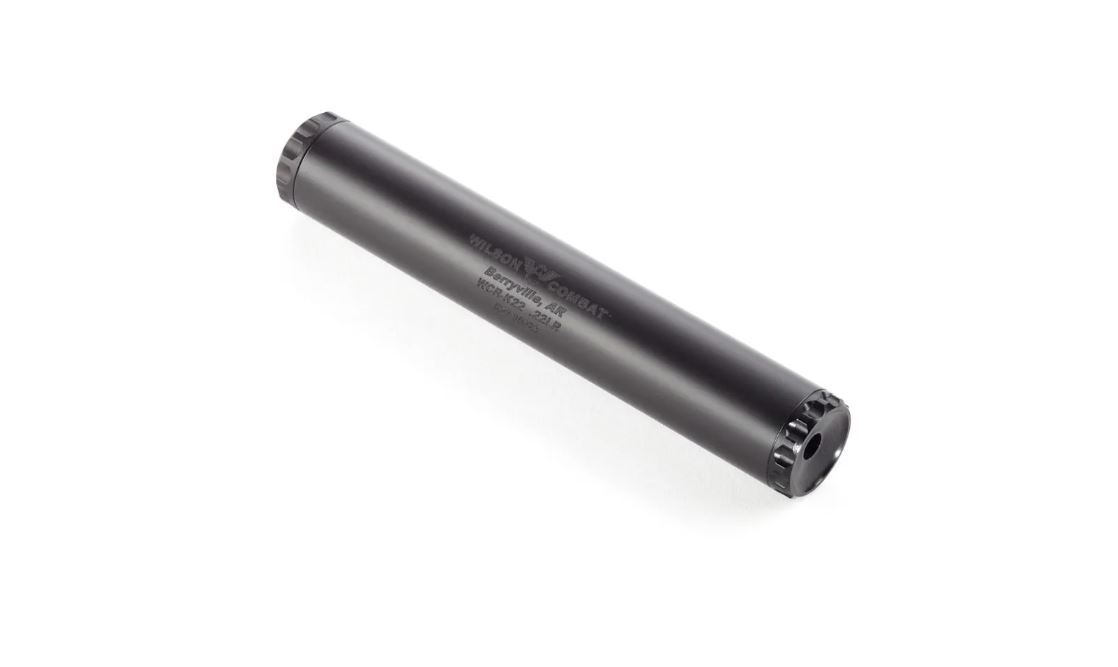 Black cylindrical firearm suppressor on white background
