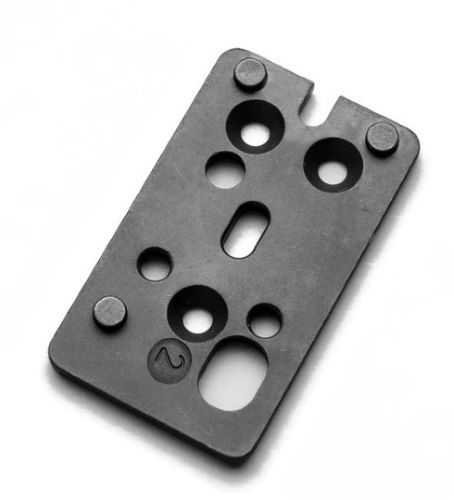 Black metal mounting plate with multiple holes