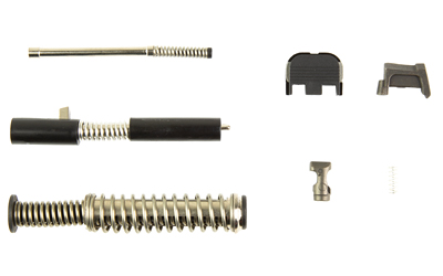 Metal springs and small mechanical components on white background