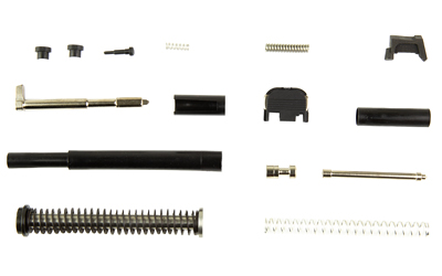 Disassembled firearm parts arranged on white background